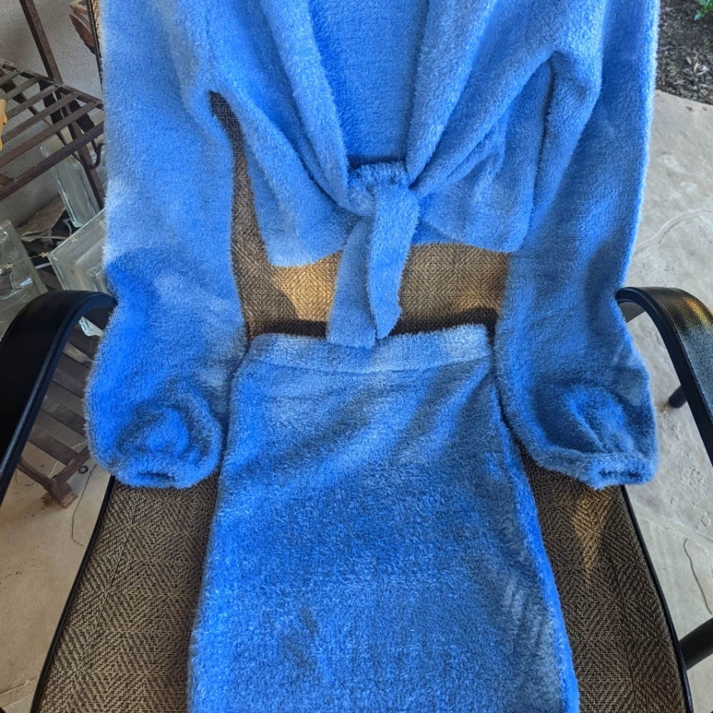 FINESSE Powder blue wrap top and sweater skirt.